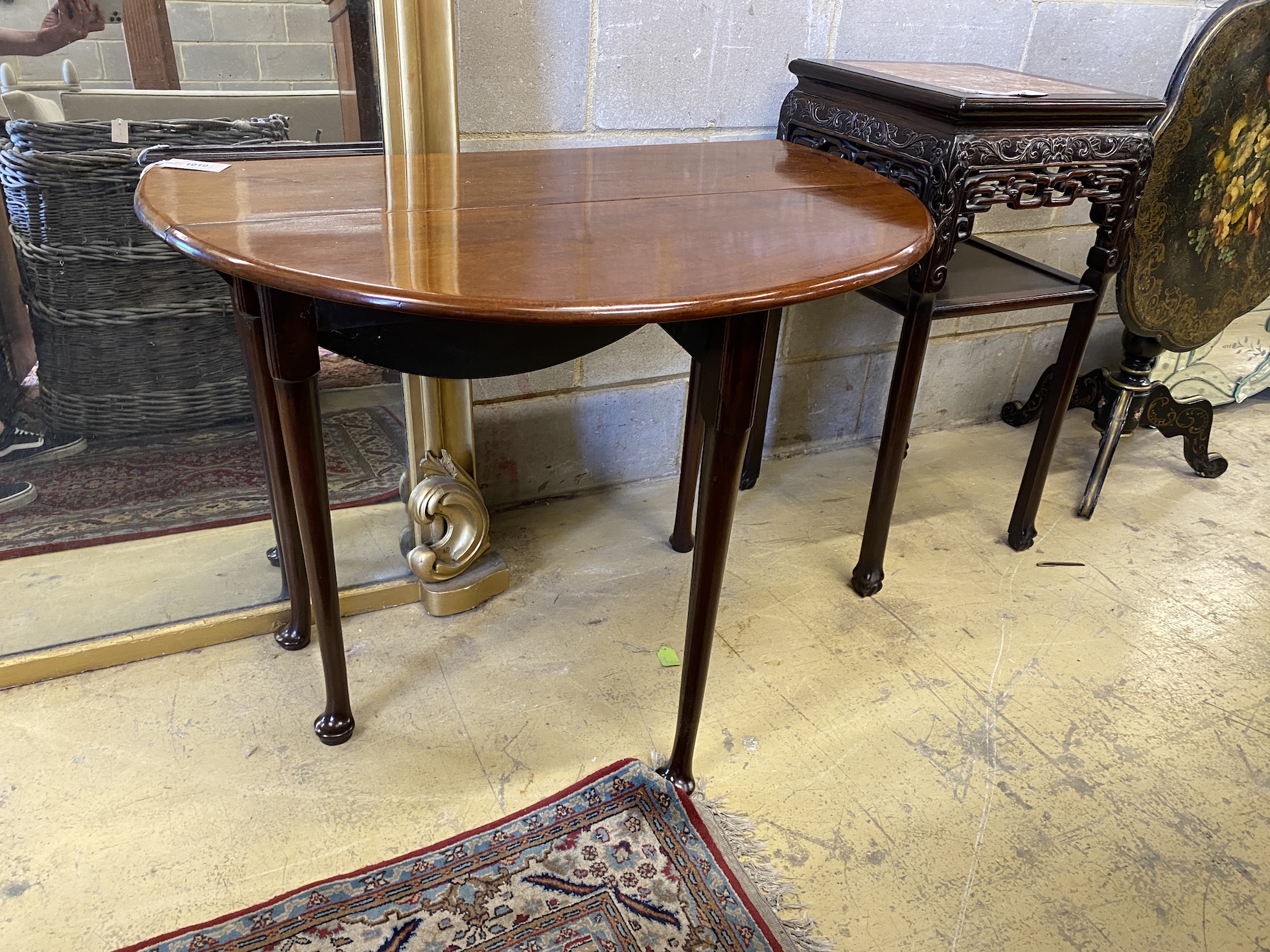 A small George III mahogany pad foot drop leaf table, 92cm extended, width 92cm, height 71cm